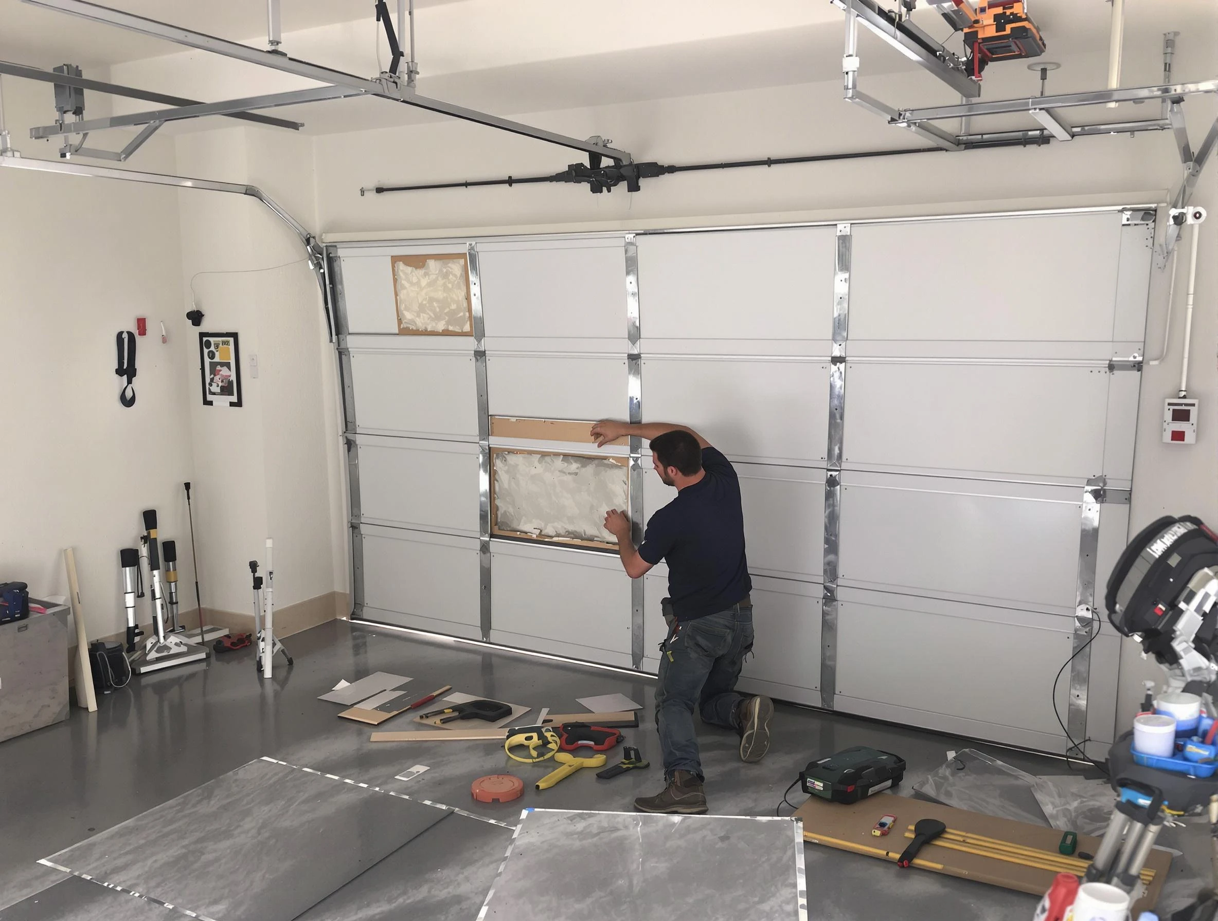 Garage Door Panel Repair in The Village